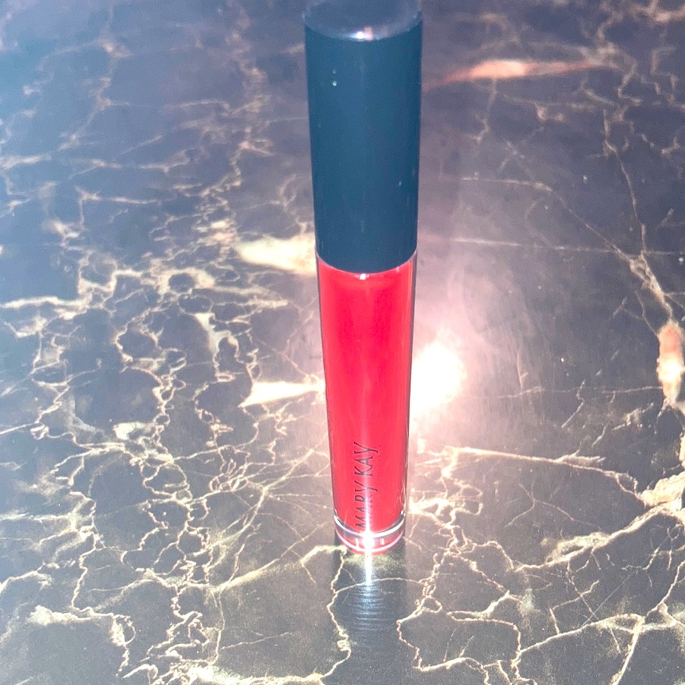 Mary Kay unlimited lip gloss in Iconic red brand new never used.